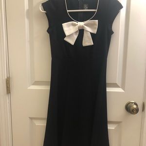 Adorable black fit and flare dress with bow